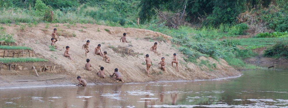Boys swimming in stream at Tat Soung 