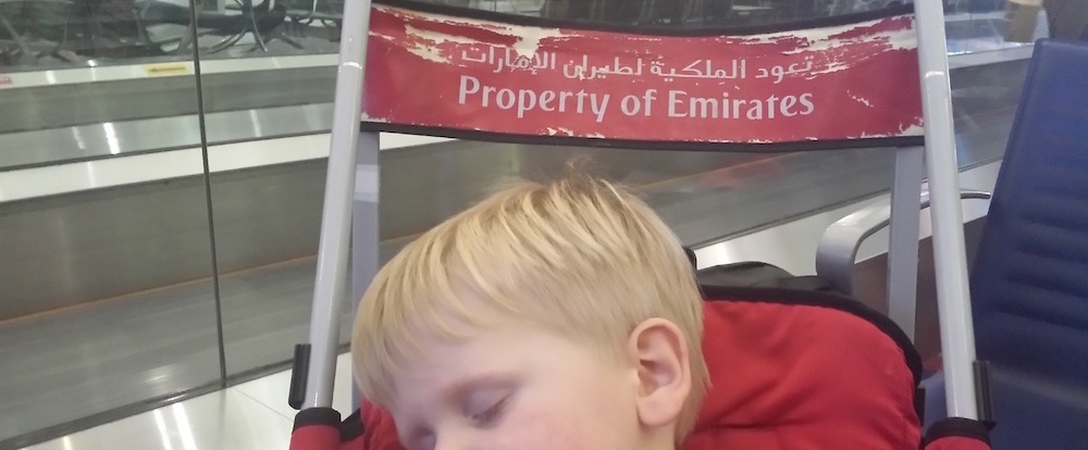 Noa sleeping at Dubai Airport blog