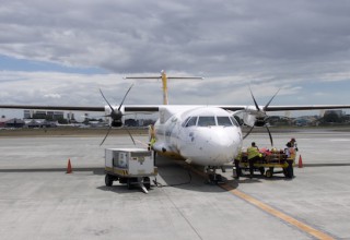 Front of plane at airport